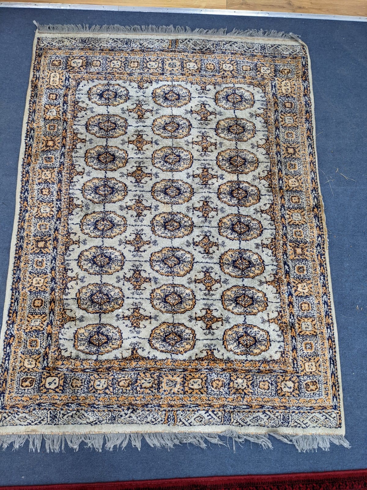 An Afghan red ground runner, 360 x 68cm and a Bokhara rug
